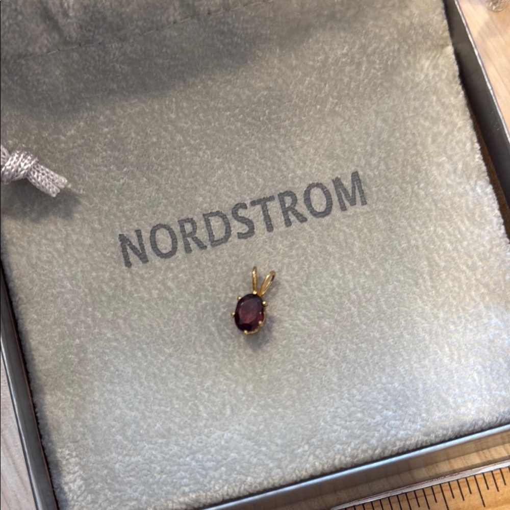 Goldtone Pendant with Garnet Color Stone